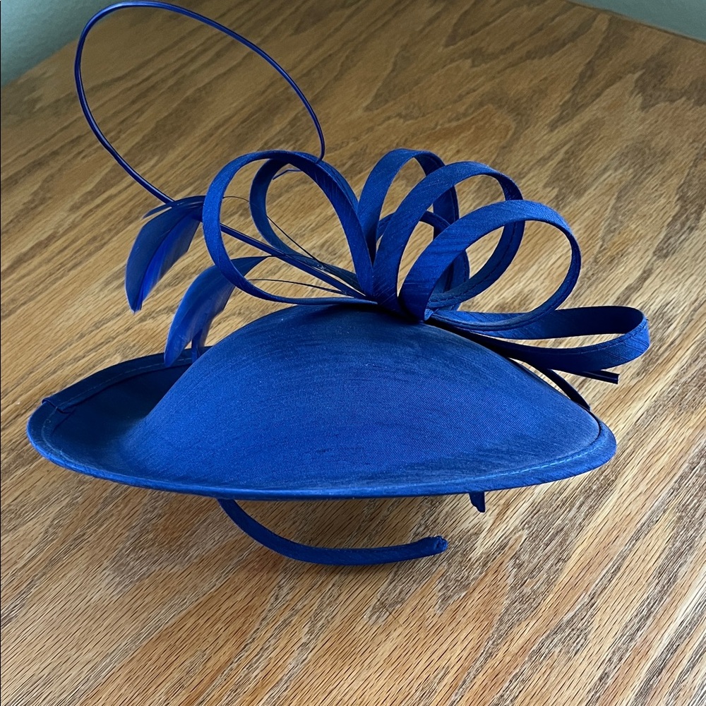Elegant Blue Fascinator Hat 10 inches diameter.